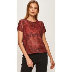 Desigual Sport - T-shirt. Brązowe topy damskie Desigual Sport, m, bez wzorów, z elastanu, z okrągłym kołnierzem. Za 179,90 zł.