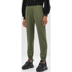 Khaki Spodnie Tawney. Brązowe spodnie damskie Born2be, uniwersalny. Za 99,99 zł.