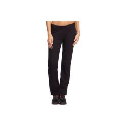 Spodnie regular Gym & Pilates 500 damskie. Czarne spodnie damskie marki DOMYOS, xs, z elastanu. Za 39,99 zł.