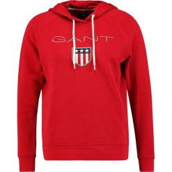 GANT SHIELD HOODIE Bluza z kapturem red. Czerwone bluzy rozpinane damskie GANT, l, z bawełny, z kapturem. Za 419,00 zł.