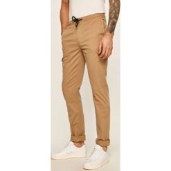 Tommy Hilfiger - Spodnie. Spodnie męskie TOMMY HILFIGER, na co dzień, bez wzorów, z elastanu. Za 539,90 zł.