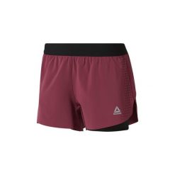 Szorty i Bermudy Reebok Sport Perforowane spodenki 2 w 1. Czerwone bermudy damskie marki Reebok Sport, s, sportowe. Za 179,00 zł.