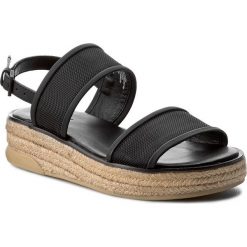 Espadryle DKNY - Shana K178254044 Black 001. Czarne espadryle damskie DKNY, bez wzorów, ze skóry, bez obcasa, na obcasie. W wyprzedaży za 339,00 zł.