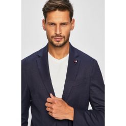 Tommy Hilfiger Tailored - Marynarka. Niebieskie garnitury męskie Tommy Hilfiger Tailored, bez wzorów, z elastanu, eleganckie. W wyprzedaży za 849,90 zł.