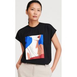 T-shirt z bawełny i modalu - Czarny. Czarne t-shirty damskie Reserved, s, bez wzorów, z bawełny, bez kołnierzyka. Za 69,99 zł.