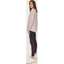 Tommy Hilfiger - Legginsy. Niebieskie spodnie damskie TOMMY HILFIGER, s, z elastanu. W wyprzedaży za 159,90 zł.