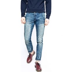 Wrangler - Jeansy Spencer Green Lagoon. Niebieskie jeansy męskie Wrangler, z aplikacjami, z obniżonym stanem. Za 319,90 zł.