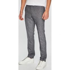 Joop! - Spodnie. Niebieskie chinosy męskie marki JOOP!, z haftami, z elastanu. Za 799,90 zł.