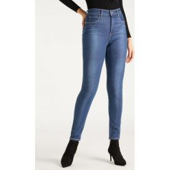 Jeansy Skinny Fit Lee Body Optix L30LMXAX. Niebieskie jeansy damskie Lee, l, bez wzorów, z elastanu. W wyprzedaży za 229,00 zł.