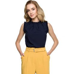 Bluzka bez rękawów z falbankami - granatowa. Bluzki dziewczęce Style, bez wzorów, z elastanu, z klasycznym kołnierzykiem, bez rękawów, bez kaptura. Za 119,00 zł.