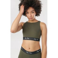 Khaki Top Daemnara. Brązowe topy damskie Born2be, s, bez wzorów, bez kołnierzyka. Za 29,99 zł.