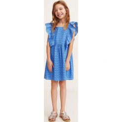 Mango Kids - Sukienka dziecięca Orquidea 110-128 cm. Niebieskie sukienki dziewczęce Mango Kids, w koronkowe wzory, z bawełny, casualowe, z krótkim rękawem, krótkie, mini, rozkloszowane. W wyprzedaży za 59,90 zł.