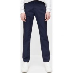 Spodnie chino slim fit - Granatowy. Niebieskie spodnie męskie Reserved, bez wzorów. Za 149,99 zł.