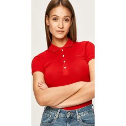 Lacoste - Polo. Czerwone bluzki damskie Lacoste, bez wzorów, z elastanu, polo, z krótkim rękawem. W wyprzedaży za 269,90 zł.