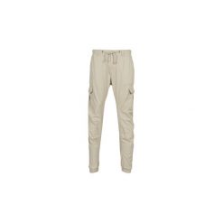 Spodnie bojówki Urban Classics CARGO JOGGING PANTS. Brązowe spodnie męskie Urban Classics, s, bez wzorów. Za 169,00 zł.