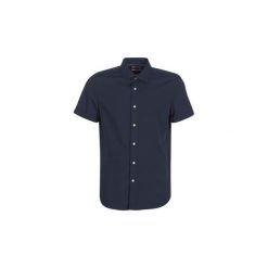 Koszule z krótkim rękawem Timberland SS SHIRT WAVES. Niebieskie koszule męskie Timberland, s, bez wzorów, bez kołnierzyka, z krótkim rękawem. Za 279,70 zł.