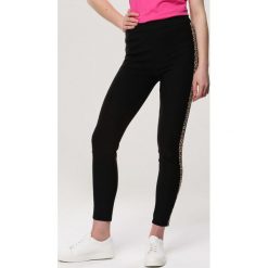 Czarno-Beżowe Legginsy Dissuade. Czarne legginsy damskie Born2be, s, bez wzorów. Za 39,99 zł.