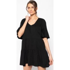 Sukienka letnia Banana Moon Kimi Peachy IBD01. Czarne sukienki damskie Banana Moon, na lato, l, bez wzorów, z bawełny, bez kołnierzyka, bez rękawów. W wyprzedaży za 239,00 zł.