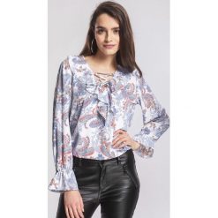 Niebieska Bluzka Stiff. Niebieskie bluzki damskie marki other, bez wzorów, bez kołnierzyka, bez rękawów. Za 39,99 zł.