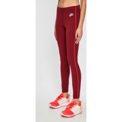 Nike Sportswear - Legginsy. Czerwone spodnie damskie Nike Sportswear, s, bez wzorów, z elastanu. W wyprzedaży za 79,90 zł.