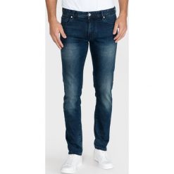 Armani Exchange J14 Dżinsy Niebieski. Niebieskie jeansy męskie Armani Exchange, bez wzorów. Za 628,95 zł.