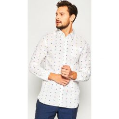 Koszula Guess Collins M02H25 WBGI0. Niebieskie koszule męskie Guess, s, z aplikacjami, z bawełny, casualowe, bez kołnierzyka, bez rękawów. W wyprzedaży za 319,00 zł.