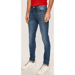 Guess Jeans - Jeansy Miami. Niebieskie jeansy męskie Guess Jeans, m, z aplikacjami. Za 369,90 zł.