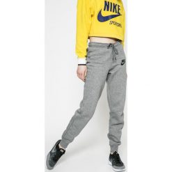 Nike Sportswear - Spodnie. Szare bez kategorii marki Nike Sportswear, s, z bawełny. W wyprzedaży za 159,90 zł.