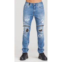 NIEBIESKIE JEANSY JUST CAVALLI Z PRZETARCIAMI. Niebieskie jeansy męskie Just Cavalli, m, bez wzorów. Za 899,50 zł.
