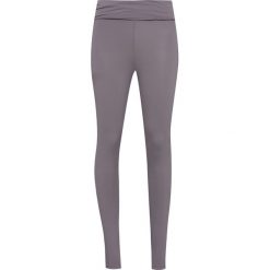 Leginsy DEHA HARMONIC Brązowy. Brązowe legginsy damskie do fitnessu marki Deha, z nadrukiem. Za 111,00 zł.
