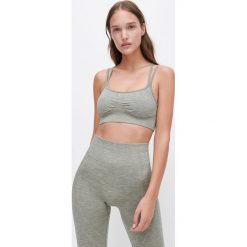 Biustonosz sportowy -. Biustonosze sportowe damskie Reserved, s, bez wzorów. Za 119,99 zł.