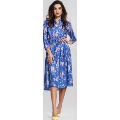 Niebieska Sukienka Autarkic. Niebieskie sukienki damskie other, m, bez wzorów, eleganckie, bez kołnierzyka, bez rękawów, midi, kopertowe. Za 99,99 zł.