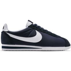 BUTY CORTEZ CLASSIC. Białe buty sportowe męskie Nike, z nylonu, bez zapięcia, do biegania, Nike Cortez. Za 339,99 zł.