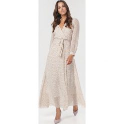 Jasnofioletowa Sukienka Adriewen. Fioletowe sukienki damskie Born2be, na lato, s, bez wzorów, bez kołnierzyka, bez rękawów. Za 149,99 zł.
