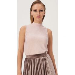 Top z błyszczącą nicia - Różowy. Różowe topy damskie Sinsay, s, bez wzorów, bez kołnierzyka. Za 29,99 zł.