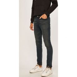 Tommy Jeans - Jeansy Simon. Niebieskie jeansy męskie Tommy Jeans, bez wzorów. W wyprzedaży za 339,90 zł.