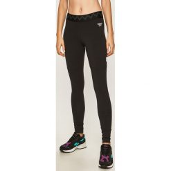 Reebok Classic - Legginsy x Gigi Hadid. Czarne spodnie damskie Reebok Classic, s, bez wzorów, z elastanu. W wyprzedaży za 219,90 zł.