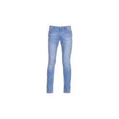 Jeansy slim fit Jack Jones JJILIAM. Szare jeansy męskie relaxed fit marki Jack & Jones, casualowe. Za 153,30 zł.