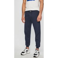 Calvin Klein Underwear - Spodnie piżamowe. Niebieskie piżamy męskie Calvin Klein Underwear, xl, bez wzorów, z elastanu, bez rękawów. W wyprzedaży za 179,90 zł.