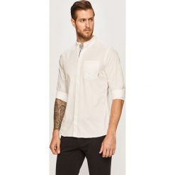 Tommy Jeans - Koszula. Białe koszule męskie Tommy Jeans, s, bez wzorów, z bawełny, casualowe, button down, z długim rękawem. W wyprzedaży za 199,90 zł.