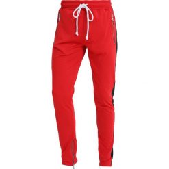 Spodnie dresowe męskie: Criminal Damage CAMDEN Spodnie treningowe red/black