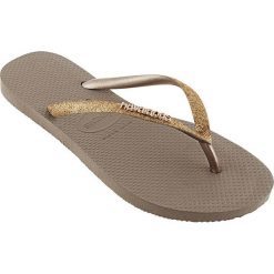 Havaianas - Japonki. Żółte klapki damskie Havaianas, bez wzorów, z materiału, bez obcasa, na obcasie. W wyprzedaży za 89,90 zł.