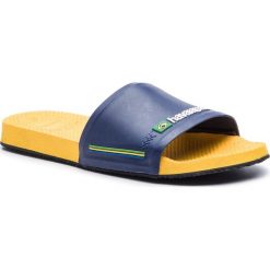 Klapki HAVAIANAS - Slide Brasil Fc 41426161652 Amarelo Banana/Banana Yellow. Niebieskie klapki damskie Havaianas, bez wzorów, z tworzywa sztucznego, bez obcasa. W wyprzedaży za 109,00 zł.