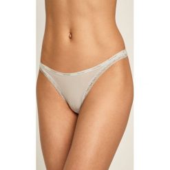 Calvin Klein Underwear - Stringi. Niebieskie majtki damskie Calvin Klein Underwear, s, bez wzorów, z elastanu. Za 69,90 zł.