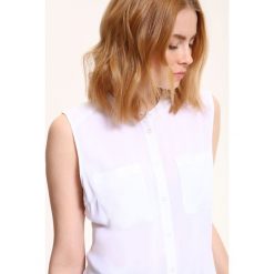 Koszula bez rękawów o luźnym kroju. Białe koszule damskie Top Secret, do pracy, bez wzorów, eleganckie, bez kołnierzyka, bez rękawów. W wyprzedaży za 19,99 zł.