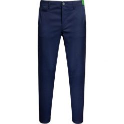 Spodnie ALBERTO ROOKIE WATERREPELLENT. Niebieskie spodnie męskie Alberto, z aplikacjami. W wyprzedaży za 343,00 zł.
