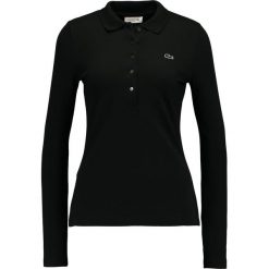 Lacoste Koszulka polo noir. Czarne koszulki damskie marki Lacoste, bez wzorów, z elastanu, polo, z długim rękawem. Za 449,00 zł.
