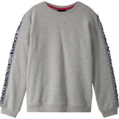 Bluza z wstawką z cekinami bonprix jasnoszary melanż. Szare bluzy dziewczęce bonprix, bez wzorów, bez rękawów, bez kaptura. Za 54,99 zł.
