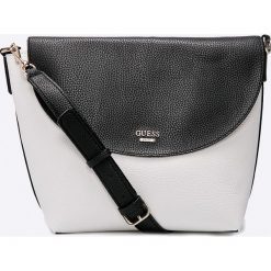 Guess Jeans - Torebka dwustronna Bobbi. Niebieskie torebki klasyczne damskie Guess Jeans, z aplikacjami, z bawełny, casualowe, na ramię, duże, bez dodatków. W wyprzedaży za 499,90 zł.