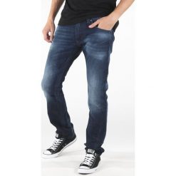 Diesel Thavar Dżinsy Niebieski. Niebieskie jeansy męskie Diesel, bez wzorów. Za 895,95 zł.